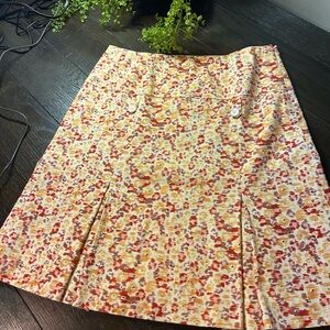 Magaschoni Cream skirt with a beautiful Yellow and Orange Floral Print
